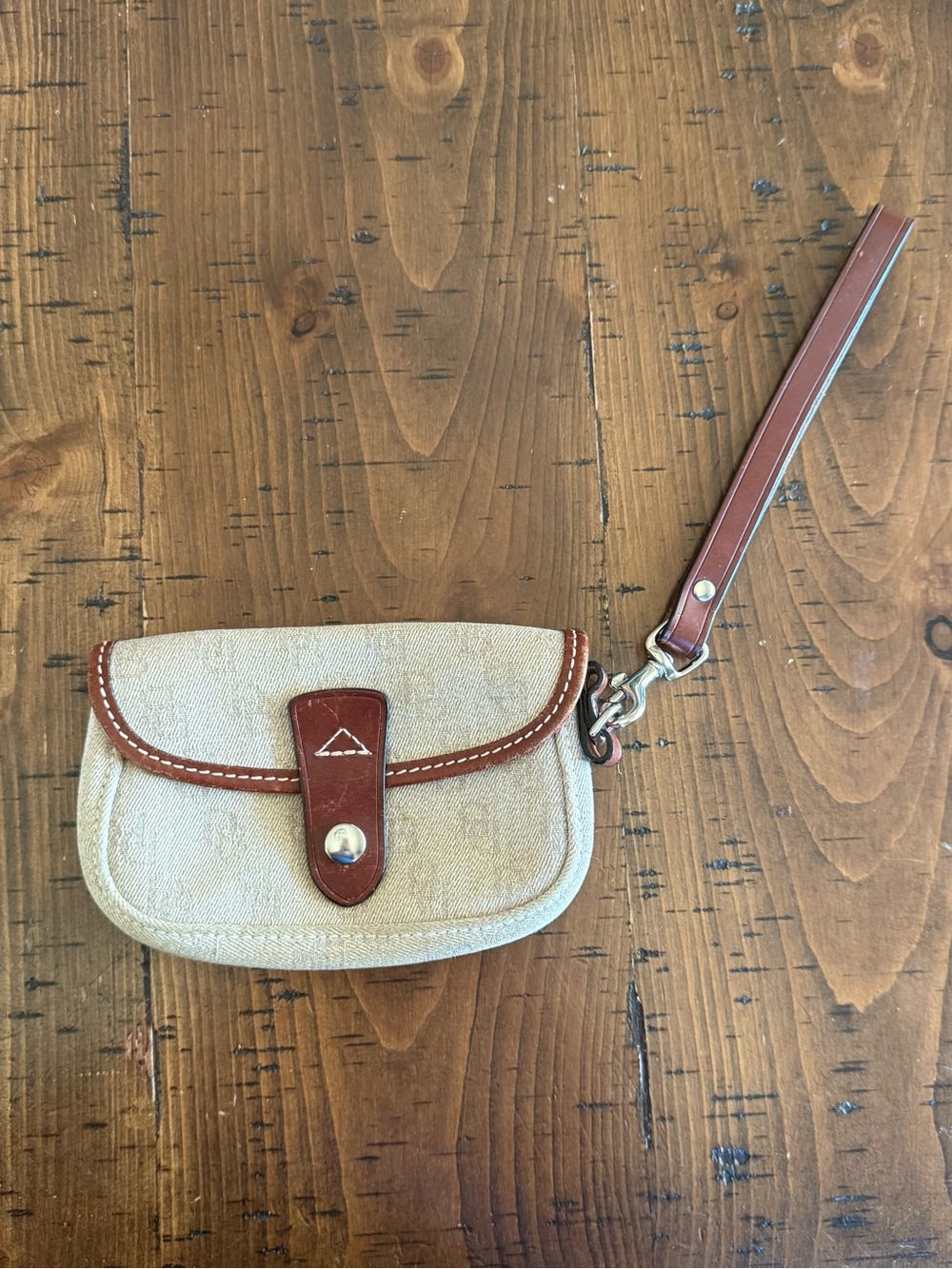 Dooney & Bourke canvas cream wristlet Brown leather trim with removable strap